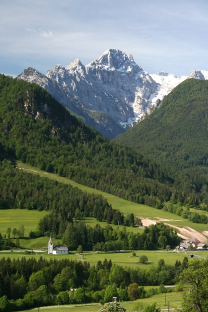 Village church of Mojstrana against Triglav backdrop