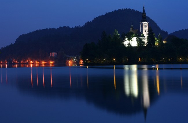 Island on Bled lake at night Image